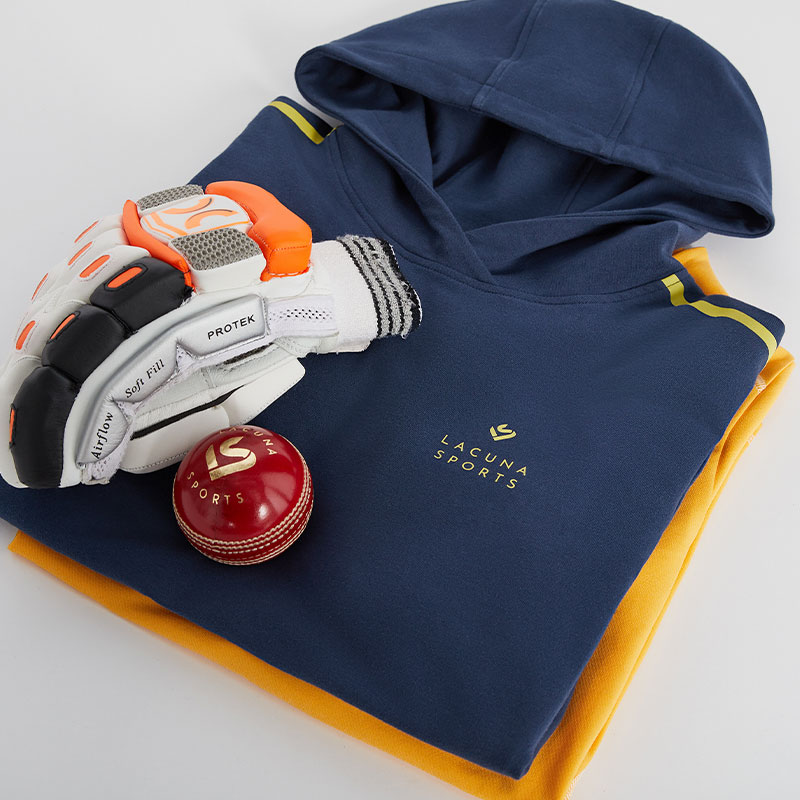 navy cricket hoodie, cricket glove and cricket ball